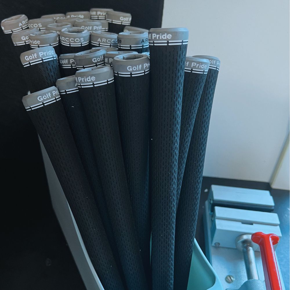 A collection of Golf Pride and Arccos grips ready to be fitted